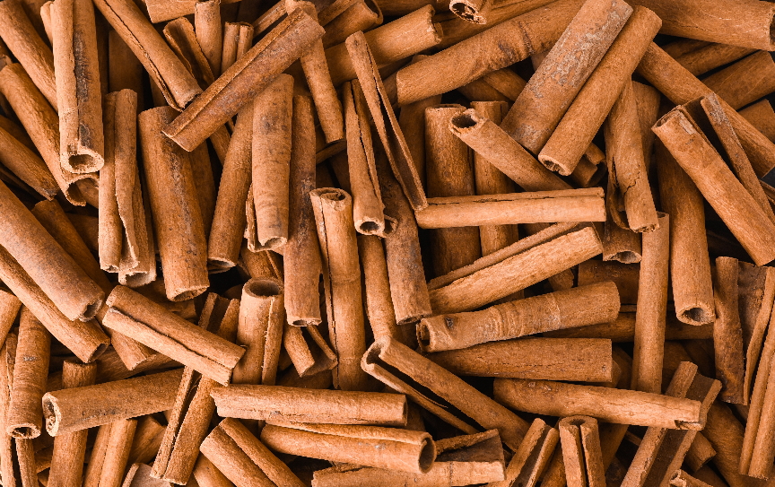 Close-up photograph of cinnamon sticks.
